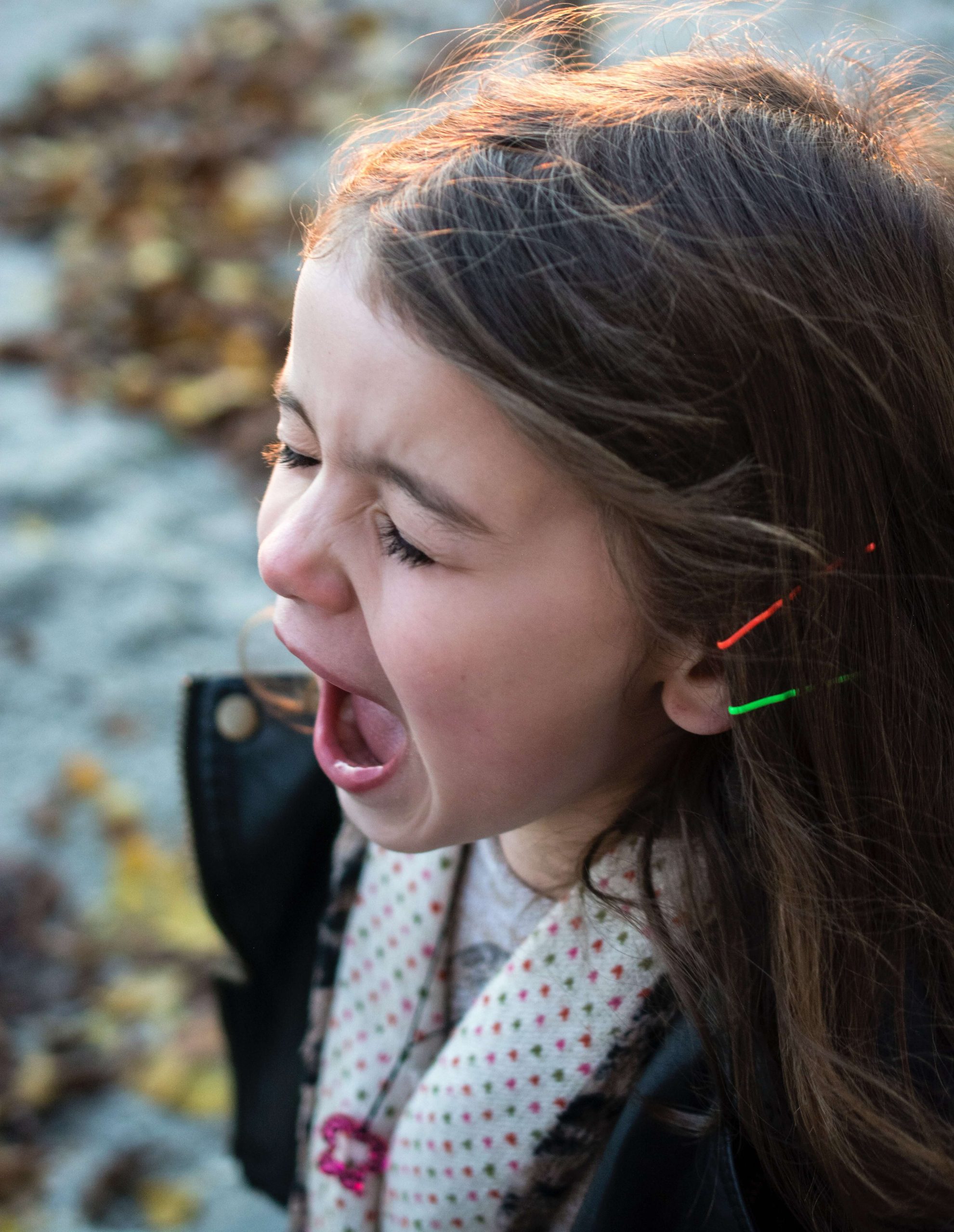 Yawning young girl