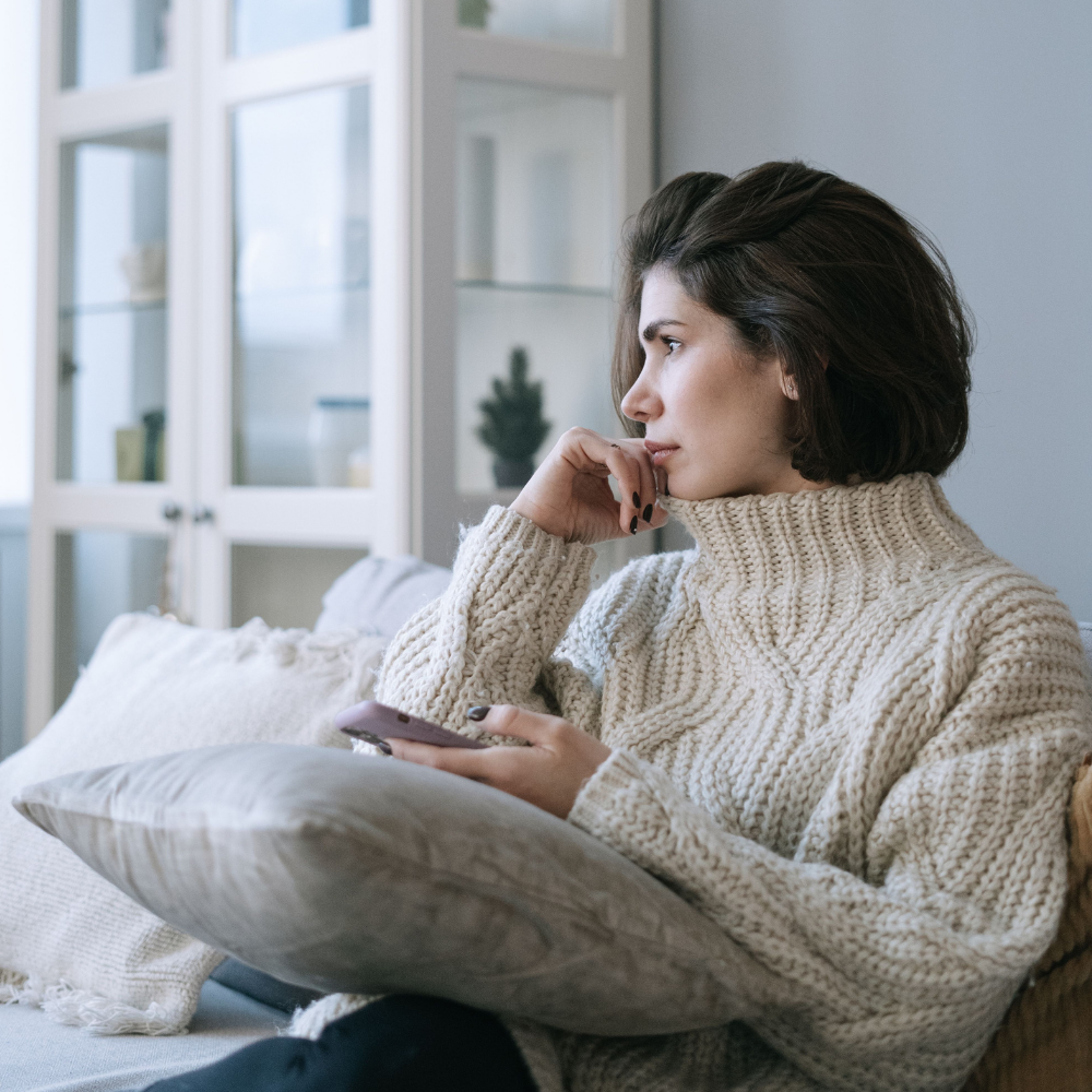 Woman looking thoughtful